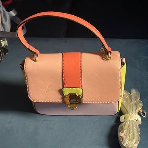 Pastel color brand new also hand bag.